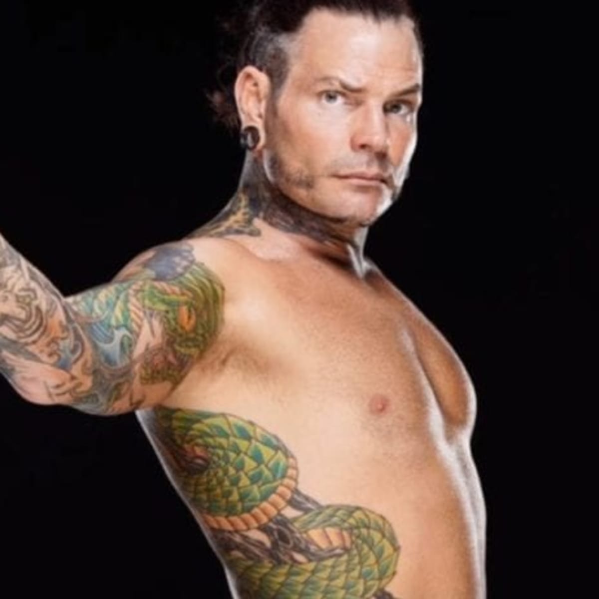 Jeff Hardy the outline of the Hardy Boyz symbol on the back of his neck and  upper back  I dont give a