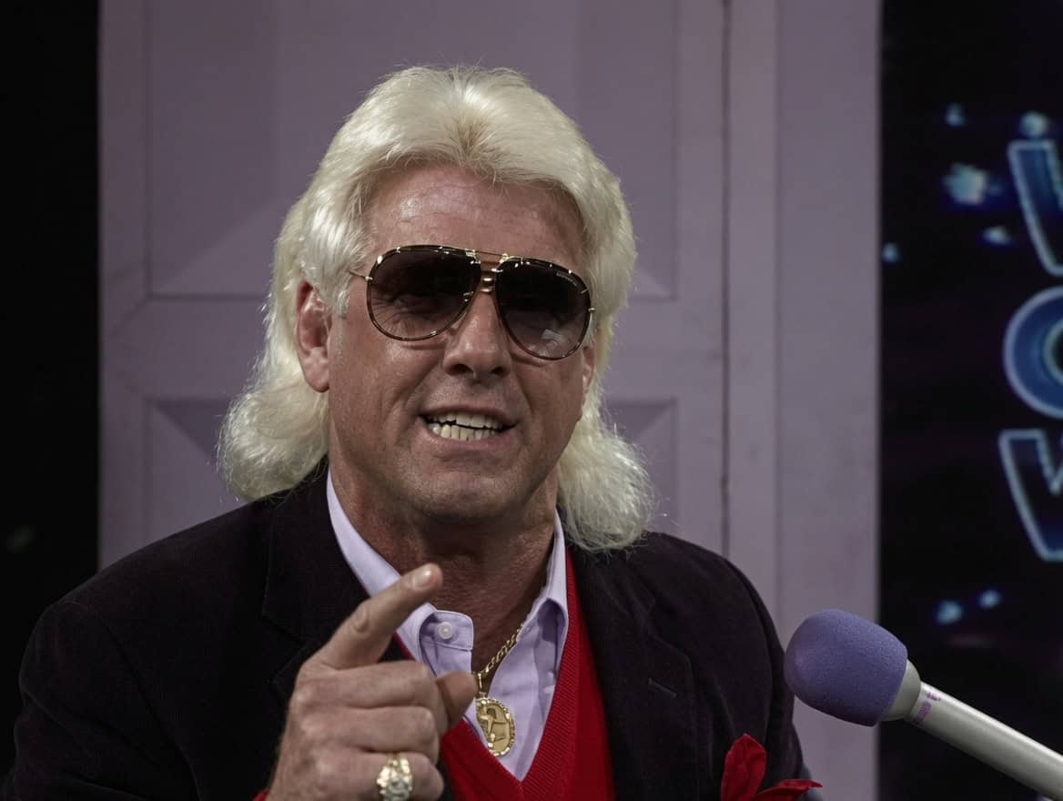 Ric Flair is telling fans to get a job and Twitter is losing its mind
