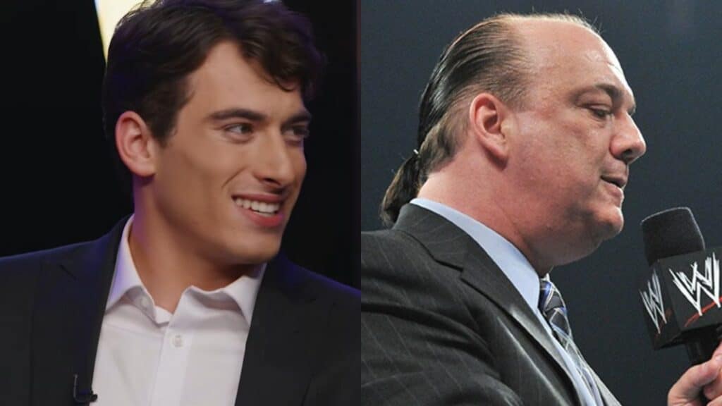 Jacob Heyman smiling on Heyman Hustle TV's The Roundtable next to Paul Heyman with his ponytail holding a WWE microphone